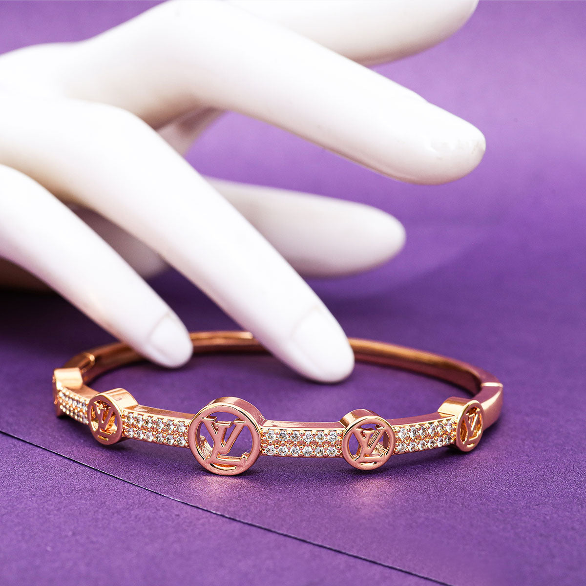 Iconic LV rose gold bangle